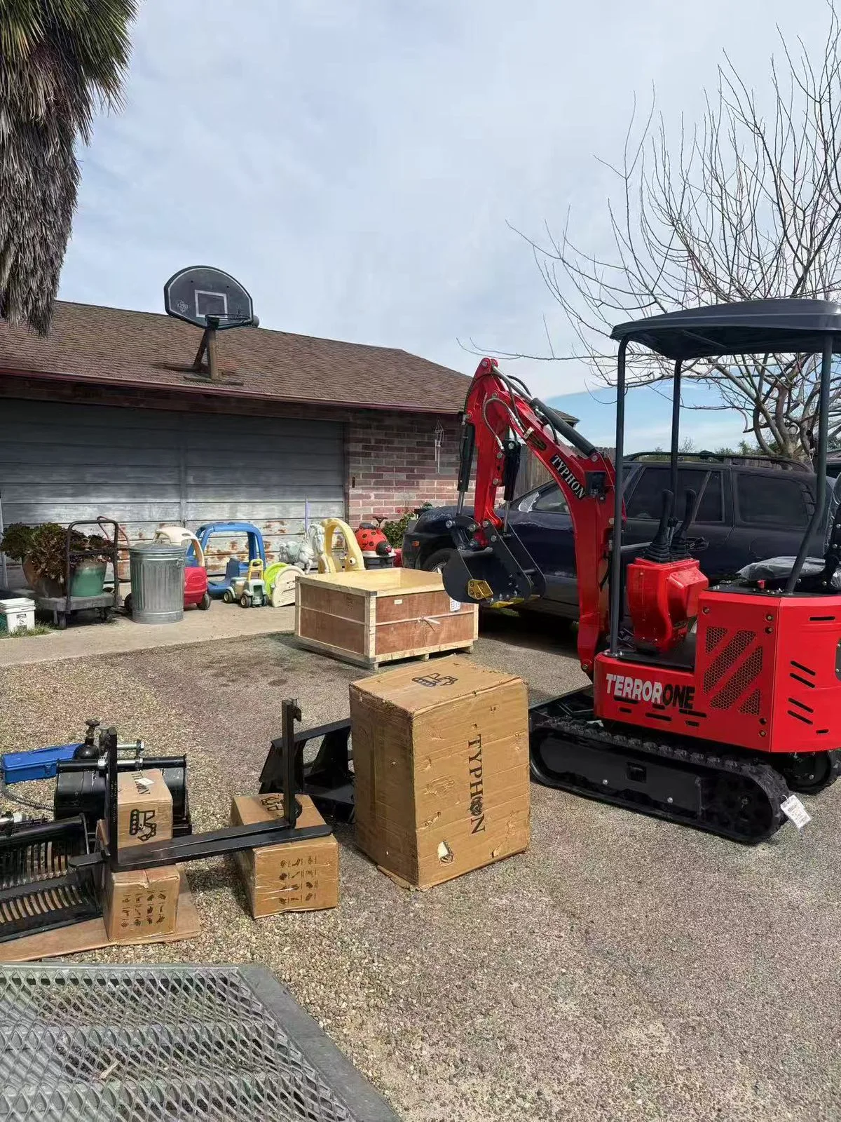 Pallets of heavy excavator buckets and attachment accessories