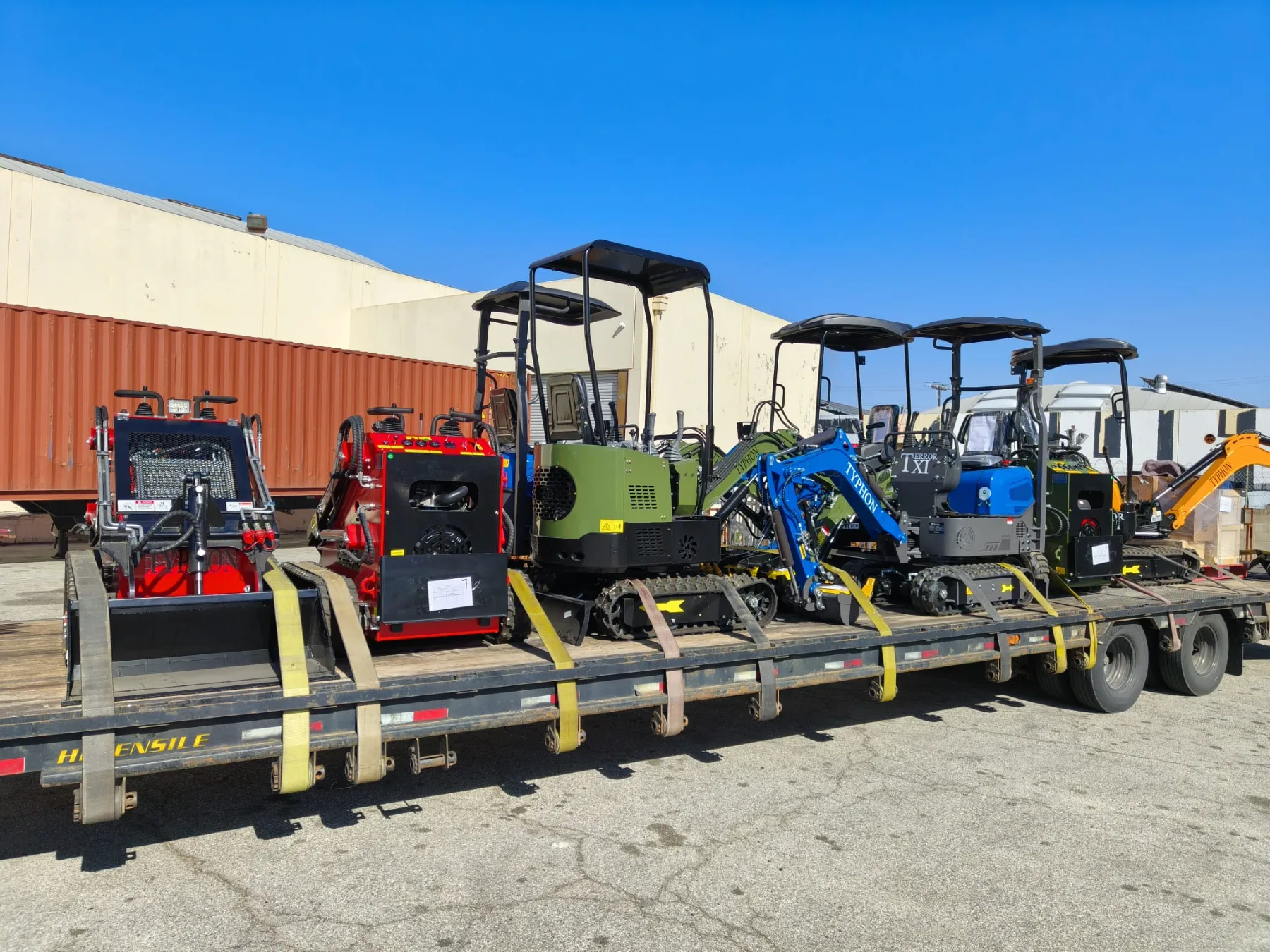 Exterior view of high-capacity flatbed loaded with industrial machinery