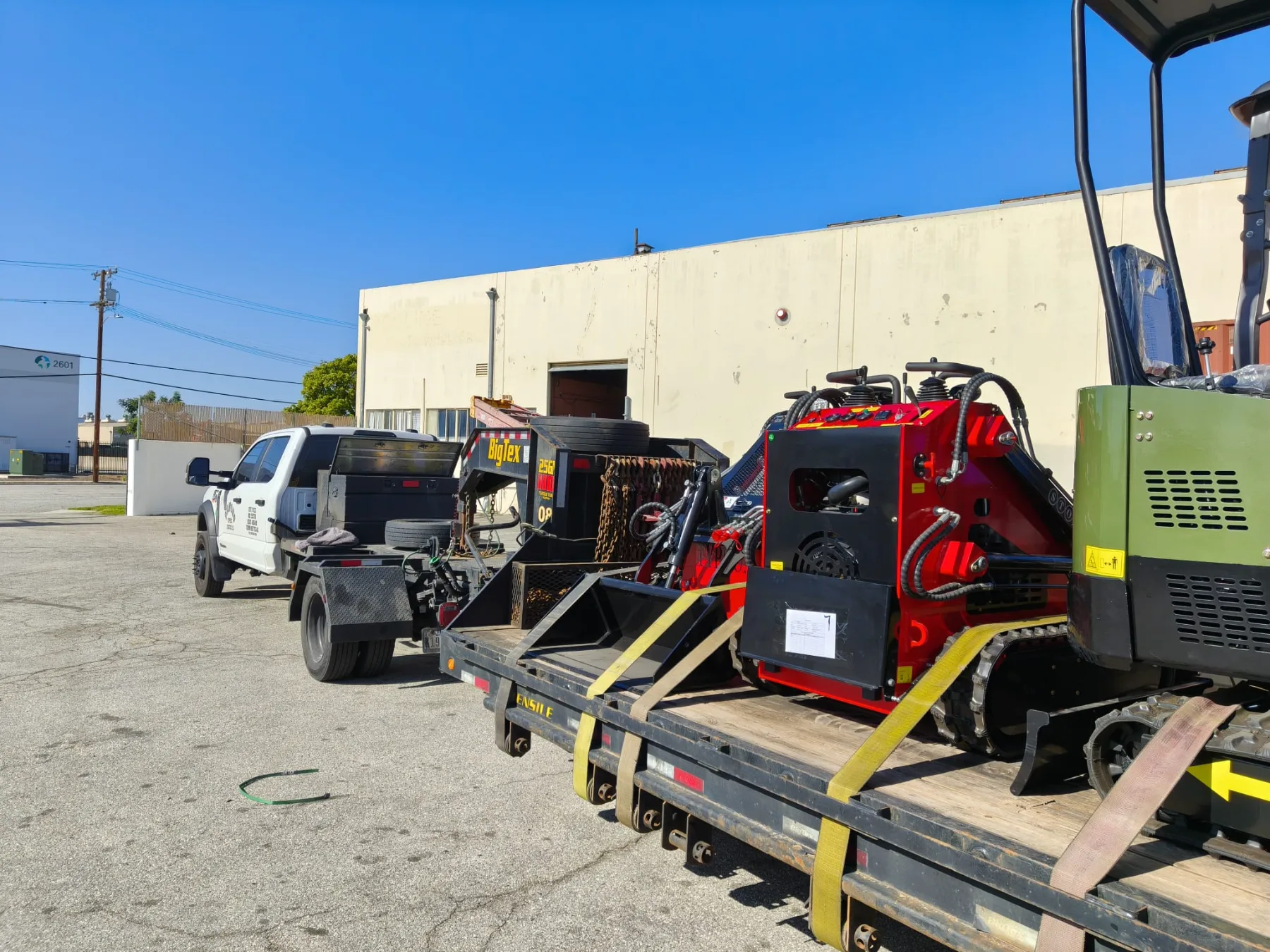 Side view of compact mini excavator showing zero tail swing clearance