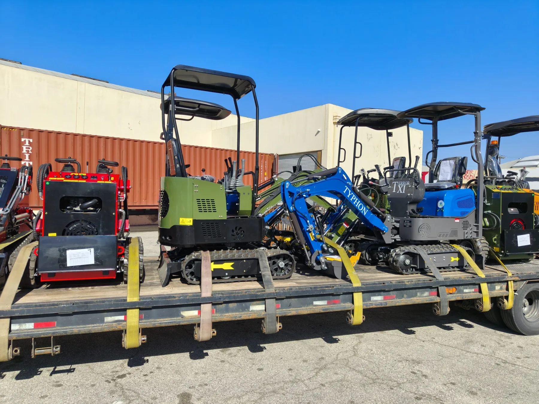 Technician prepping machine surfaces and decals before shipping