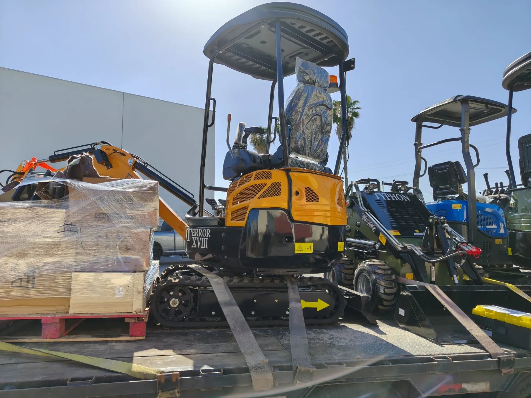 Export-grade wooden crates holding compact industrial equipment