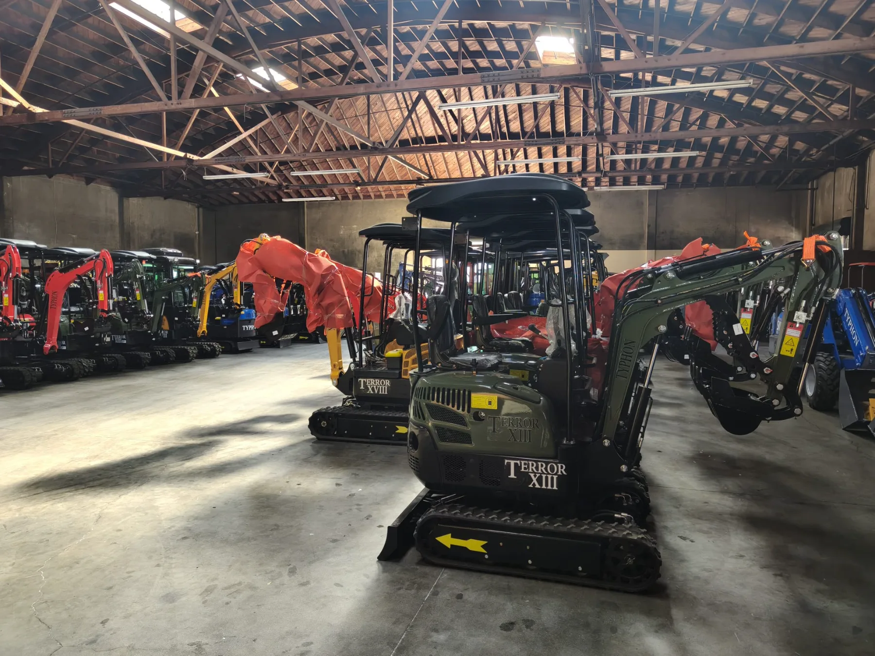 Equipment being guided toward loading ramp at facility
