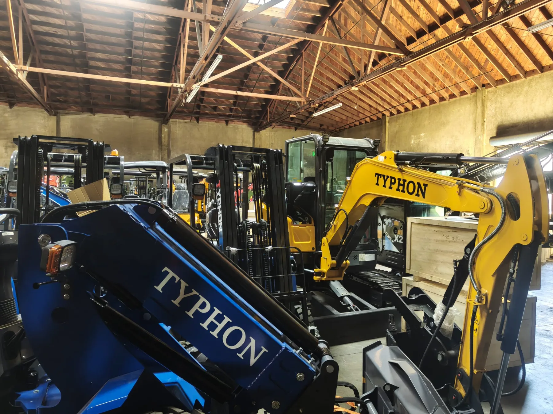 Long perspective of machinery row inside the main warehouse