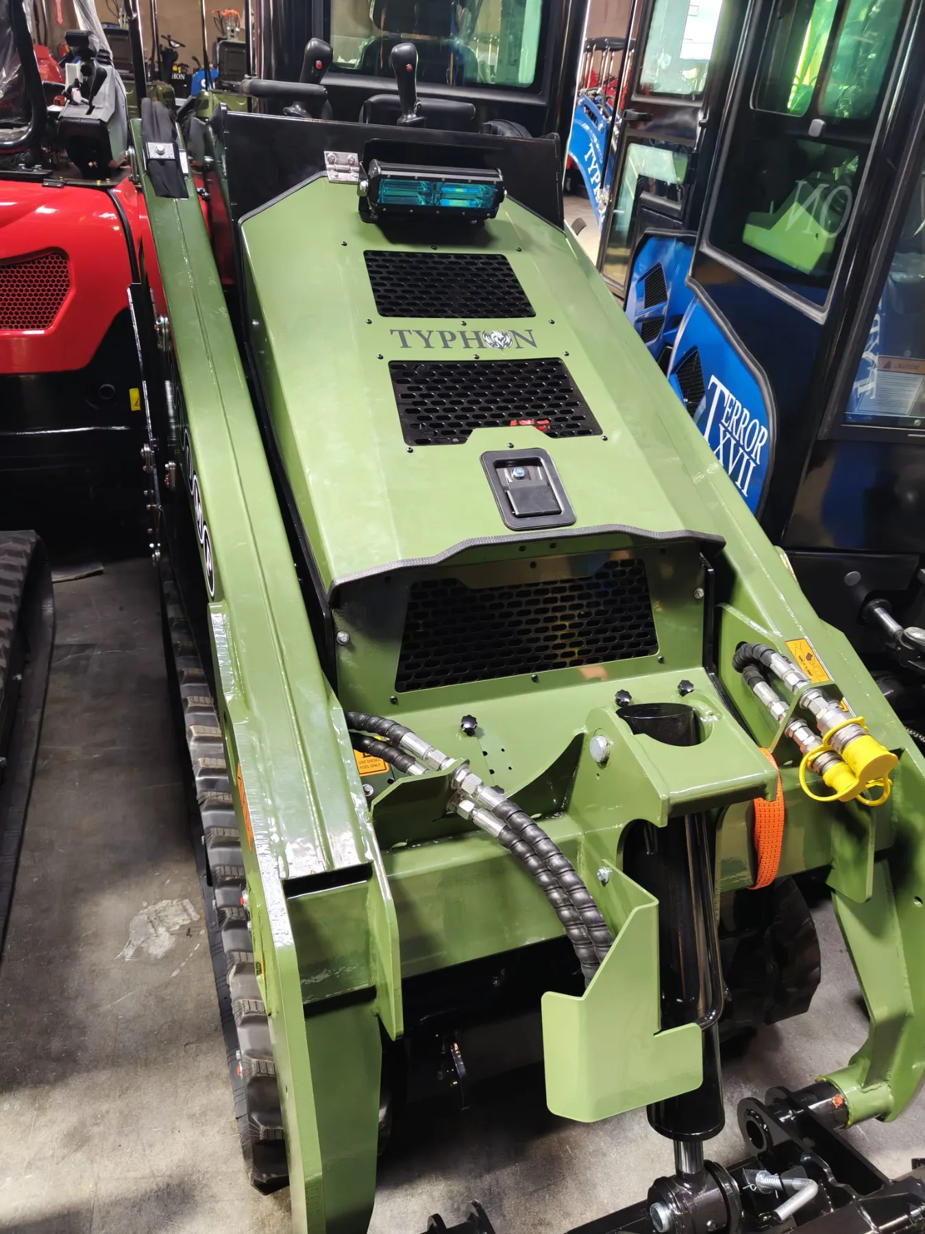 Weld-on thumb bracket and hydraulic cylinder on excavator stick
